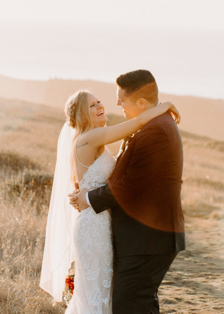 bride and groom laughing, Mendocino elopement, mendocino wedding, christmas elopement, best places to elope in california, norcal elopement, northern california elopement, elopement inspo, california coast elopement, mendocino california elopement, Rachel Christopherson Photography 