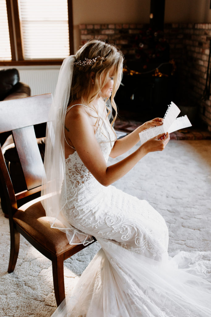 bride reading wedding letter with veil on, christmas elopement, best places to elope in california, norcal elopement, northern california elopement, elopement inspo, california coast elopement, Rachel Christopherson Photography