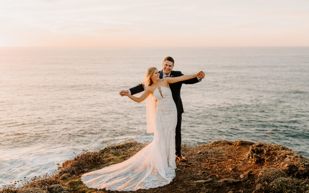 bride and groom airplane arms at ocean, Mendocino elopement, mendocino wedding, christmas elopement, best places to elope in california, norcal elopement, northern california elopement, elopement inspo, california coast elopement, mendocino california elopement, Rachel Christopherson Photography 
