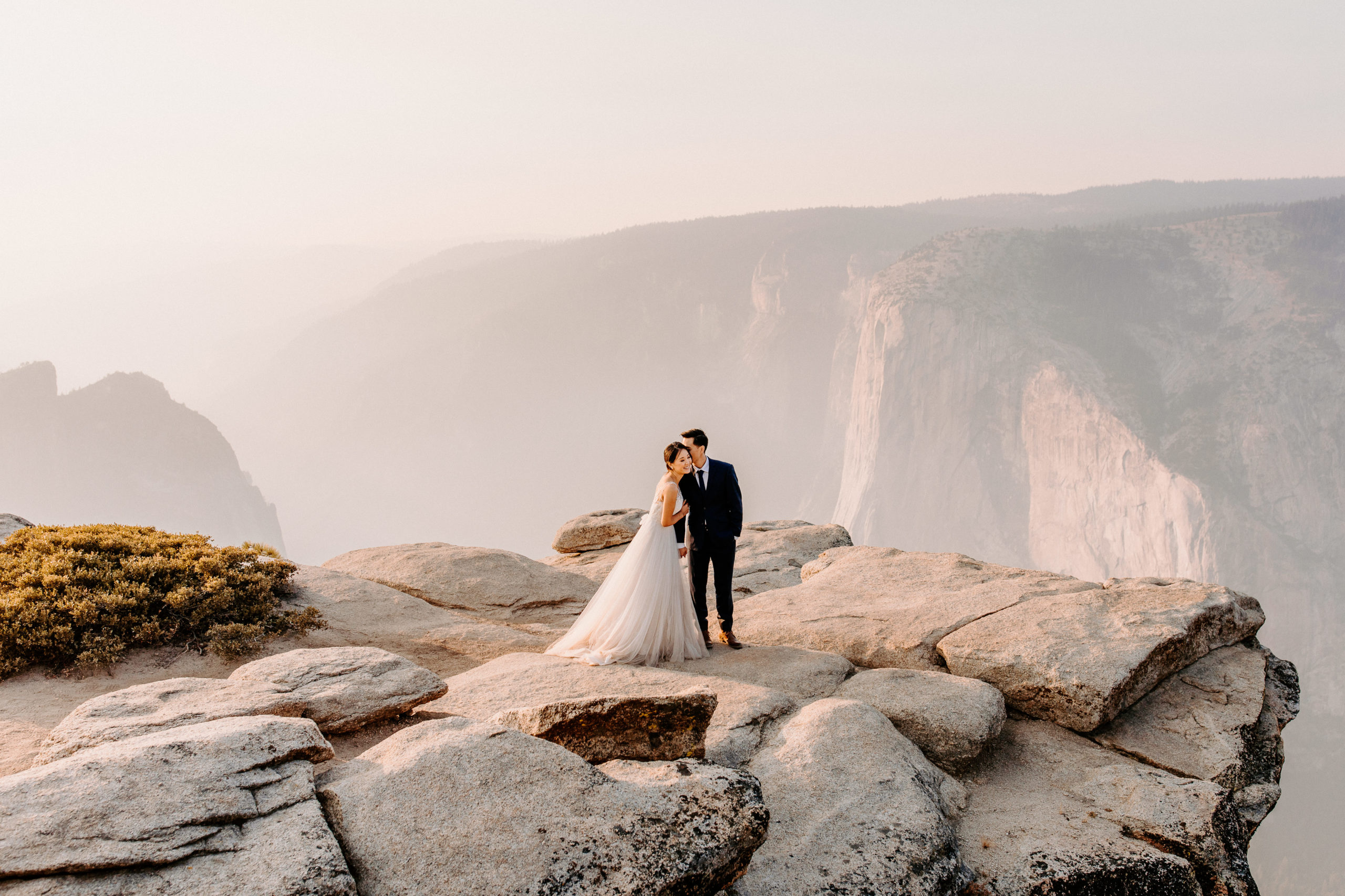 Wide shot of Bride and groom at Taft Point,, Taft Point elopement, Yosemite Elopement, Glacier Point Elopement, best places to elope in california, northern california elopement, Rachel Christopherson Photography