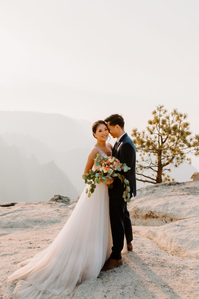 Bride and groom at Taft Point, elopement bouquet, Taft Point elopement, Yosemite Elopement, Glacier Point Elopement, best places to elope in california, northern california elopement, Rachel Christopherson Photography