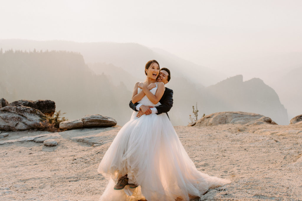 Groom lifting bride from behind, Taft Point elopement, Yosemite Elopement, Glacier Point Elopement, best places to elope in california, northern california elopement, Rachel Christopherson Photography