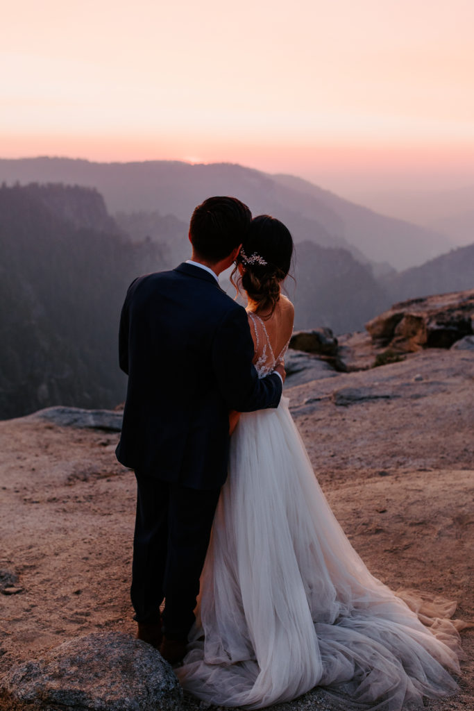bride and groom looking at sunset, Taft Point elopement, Yosemite Elopement, Glacier Point Elopement, best places to elope in california, northern california elopement, Rachel Christopherson Photography