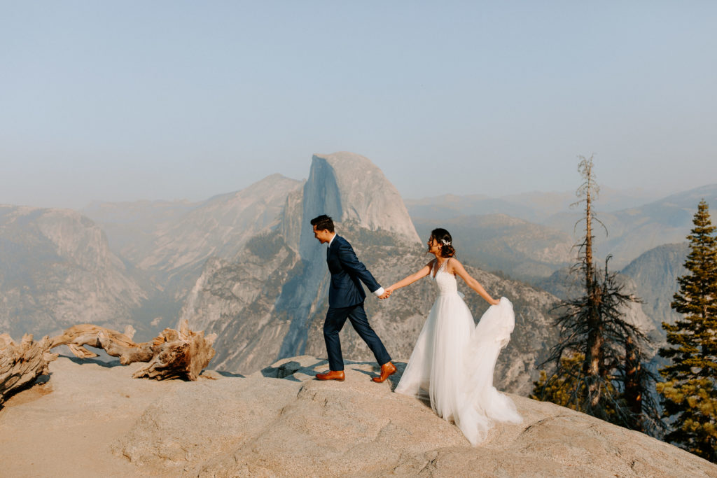 Bride and groom walking at Glacier Point, Yosemite Elopement, Glacier Point Elopement, best places to elope in california, northern california elopement, Rachel Christopherson Photography