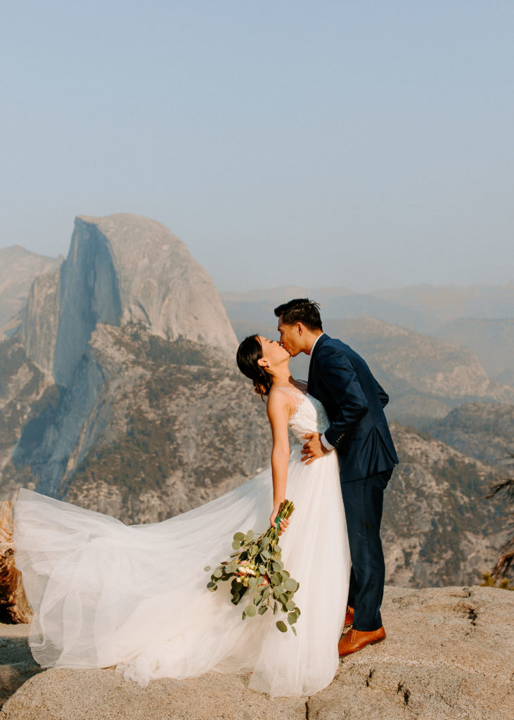 groom dipping bride at Glacier Point, Yosemite Elopement, Glacier Point Elopement, best places to elope in california, northern california elopement, Rachel Christopherson Photography