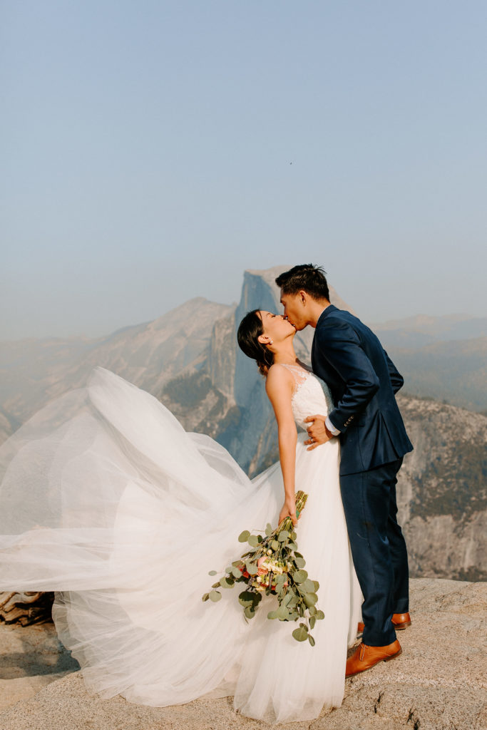 groom dipping bride at Glacier Point, Yosemite Elopement, Glacier Point Elopement, best places to elope in california, northern california elopement, Rachel Christopherson Photography
