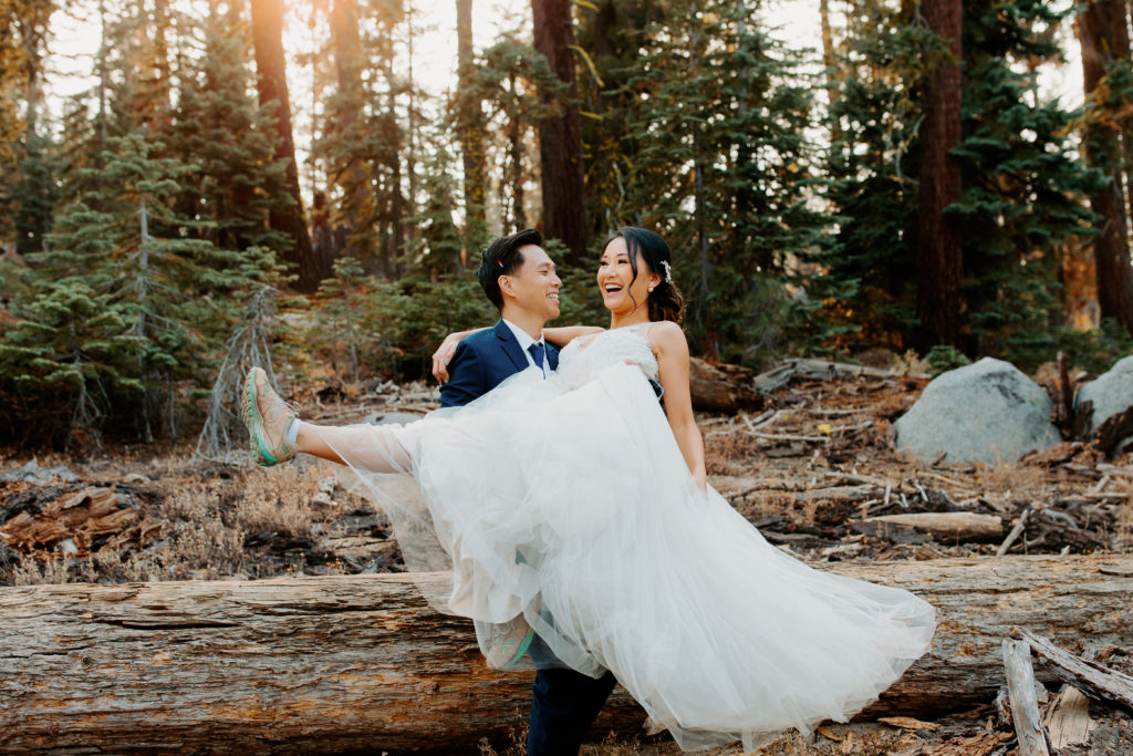 bride and groom walk across log in forest, Taft Point elopement, Yosemite Elopement, Glacier Point Elopement, best places to elope in california, northern california elopement, Rachel Christopherson Photography