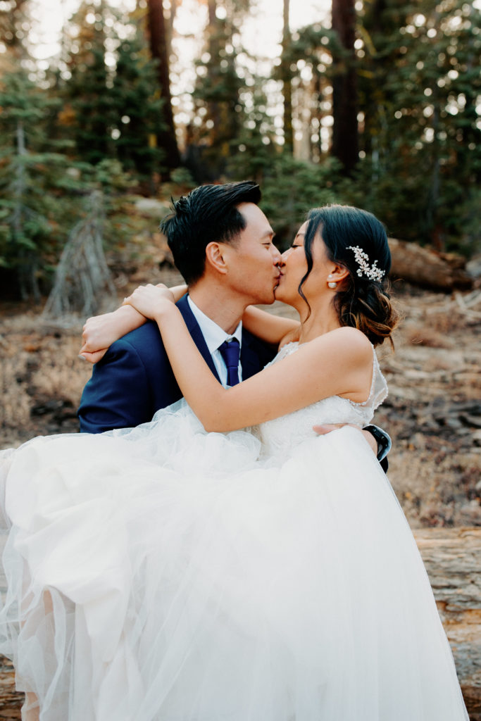close up of bride and groom kiss in forest, adventurous bride, wedding dress and hiking boots, Taft Point elopement, Yosemite Elopement, Glacier Point Elopement, best places to elope in california, northern california elopement, Rachel Christopherson Photography