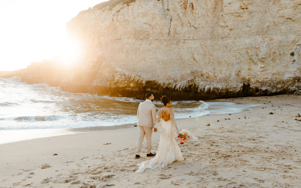 bride and groom walking on beach, Santa cruz wedding, santa cruz elopement, santa cruz wedding photographer, santa cruz elopement photographer, big sur elopement, boho beach bride, california boho elopement, boho wedding dress, best places to elope in California, California elopement, California beach elopement, boho bride inspo, Rachel Christopherson Photography