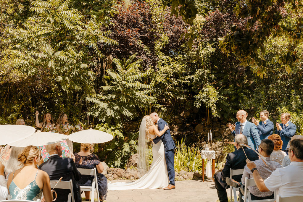 Rachel Christopherson Photography-Sacramento Garden Wedding-Rustic Wedding-Summer Wedding-Northern California-Nor Cal-Wedding Ceremony-Exchanging Vows-Wedding Dress With Train-Bridal Veil-Navy Groom's Suit