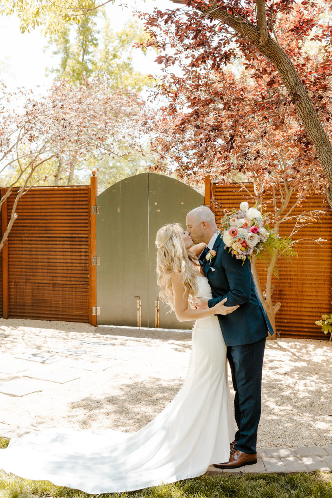 Rachel Christopherson Photography-Sacramento Garden Wedding-Rustic Wedding-Summer Wedding-Northern California-Nor Cal-Bride and Groom-Wedding Dress With Train-Bride and Groom First Look-Navy Suit-Bridal Hair-Bridal Bouquet