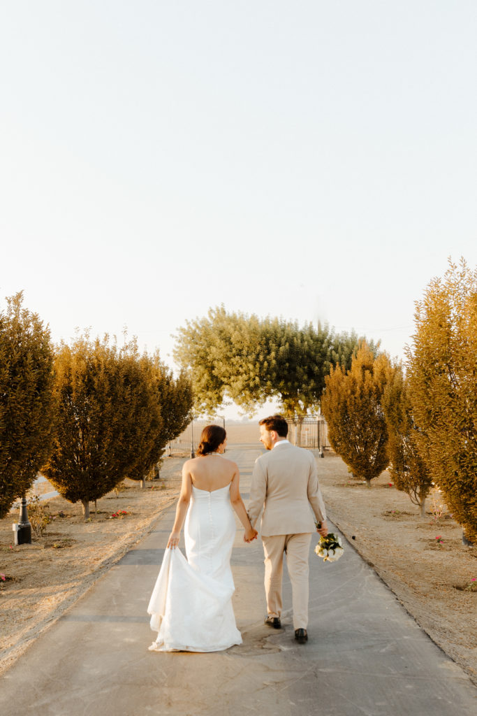 rachelchristophersonphotography-northern califorrnia wedding-traditional wedding-nor cal wedding-traditional ceremony-northern california wedding photographer-sacramento wedding-sacramento wedding photographer-ranch wedding-golden hour-lacey wedding dress-beige grooms suit-long train veil-bridal veil