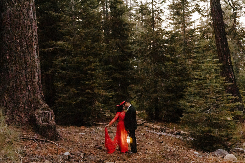 rachelchristophersonphotos-glacier point yosemite elopement-yosemite elopement-glacier point elopement-mountain top elopement-northern california elopement-bride and groom-slick black suit-traditional vietnamese wedding dress