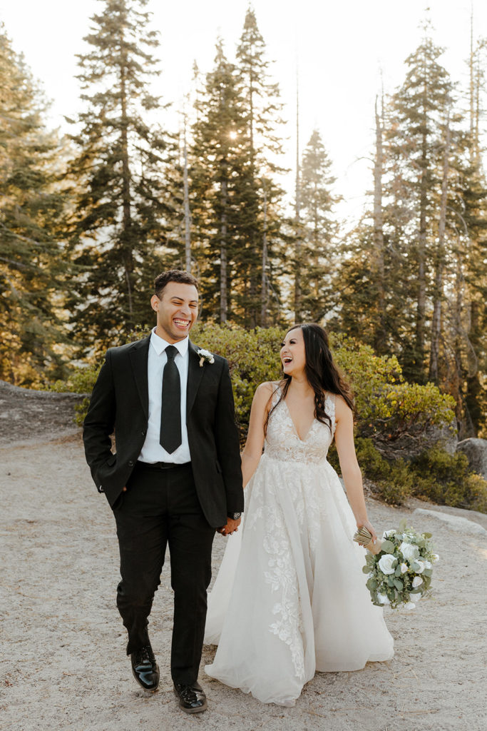 rachelchristophersonphotos-glacier point yosemite elopement-yosemite elopement-glacier point elopement-mountain top elopement-northern california elopement-bride and groom-slick black suit-lacey floral wedding gown