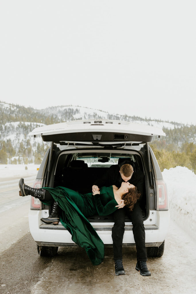 Rachel Christopherson Photography - lake tahoe winter engagement photos, engaged couple snuggled in car parked in front of snowy mountains