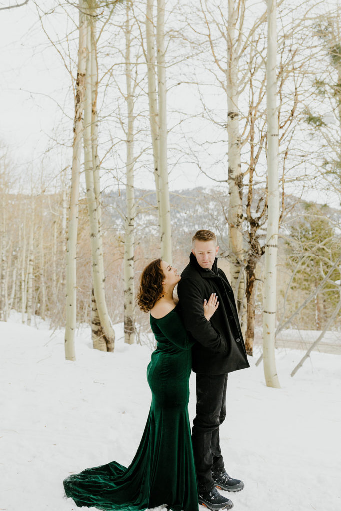 Rachel Christopherson Photography - Northern California winter engagement photos, engaged couple posing in front of snowy forest