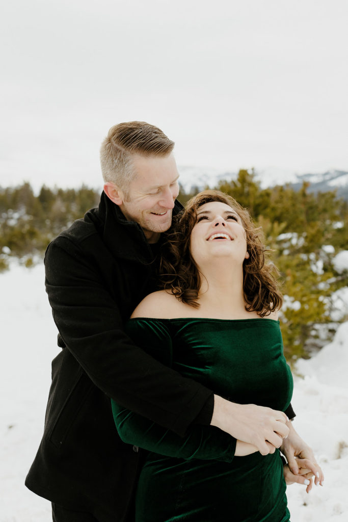 Rachel christopherson Photography - engaged couple with arms around each other laughing
