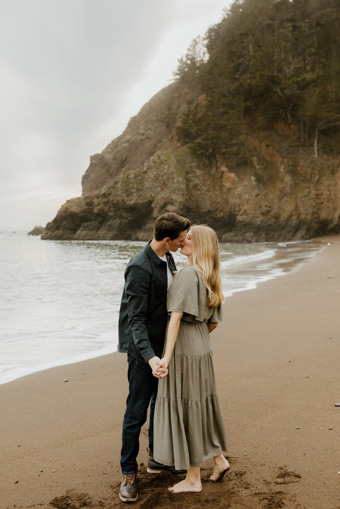 Rachel Christopherson Photography - Engaged couple kissing on northern california beach , kirby cove engagement photos, beach engagement