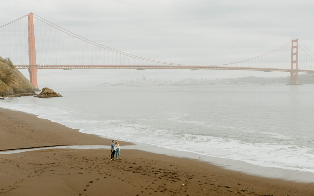 Rachel Christopherson Photography - Engaged couple on northern california beach in front of golden gate bridge, SF engagement photos, beach engagement photos