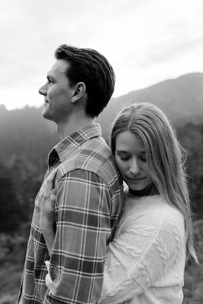 Rachel Christopherson Photography - Engaged couple holding each other, candid engagement photos. kirby cove engagement photos, black and white engagement photos