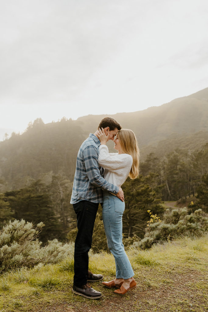 Rachel Christopherson Photography - Engaged couple holding each other. kirby cove engagement photos