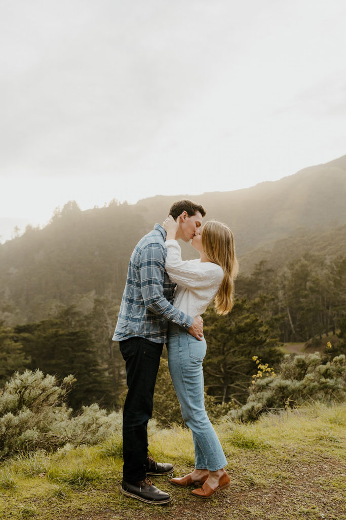 Rachel Christopherson Photography - Engaged couple kissing. kirby cove engagement photos