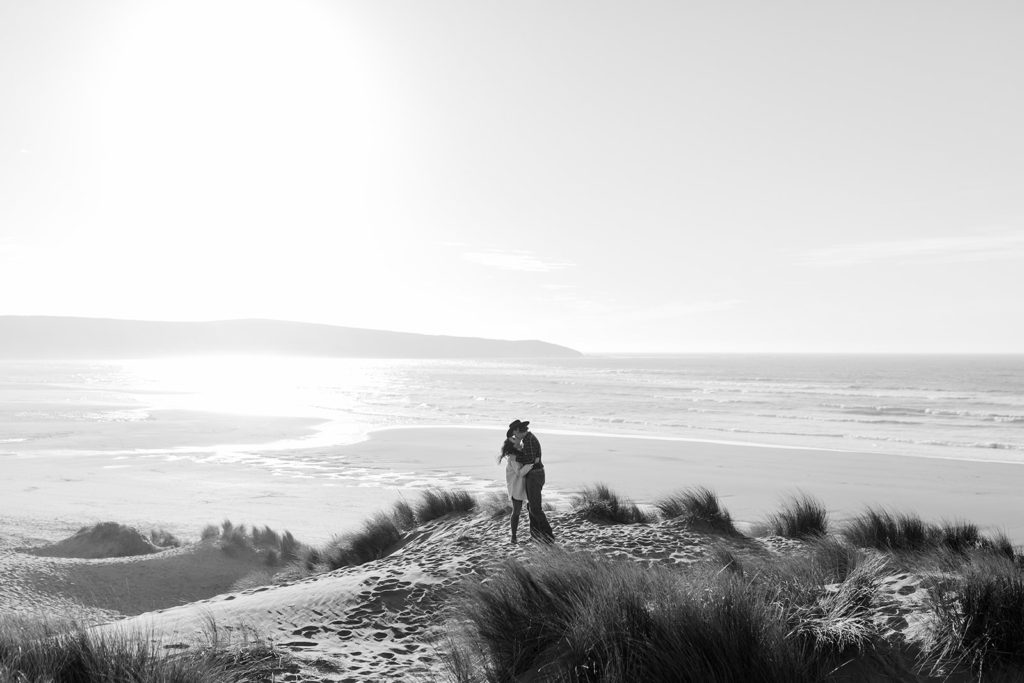 Rachel Christopherson Engagement Photographer-Engaged couple kissing on beach, black and white engagement photos-San Francisco Engagement Photos, Northern California Engagement Photos, Point Reyes Engagement Photos, Bodega Bay Engagement Photos, Dillon Beach Engagement Photos, Bay Area Engagement Photos