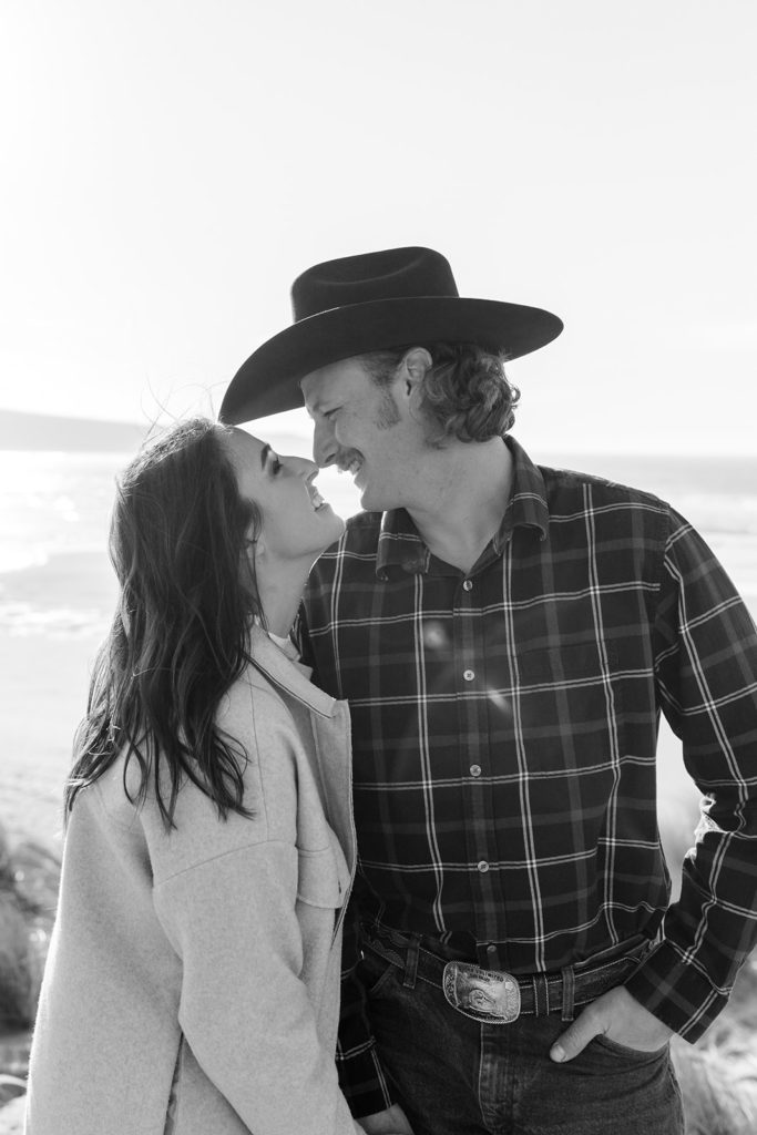 Rachel Christopherson Engagement Photographer-Engaged couple smiling at each other -San Francisco Engagement Photos, Northern California Engagement Photos, Point Reyes Engagement Photos, Bodega Bay Engagement Photos, Dillon Beach Engagement Photos, Bay Area Engagement Photos