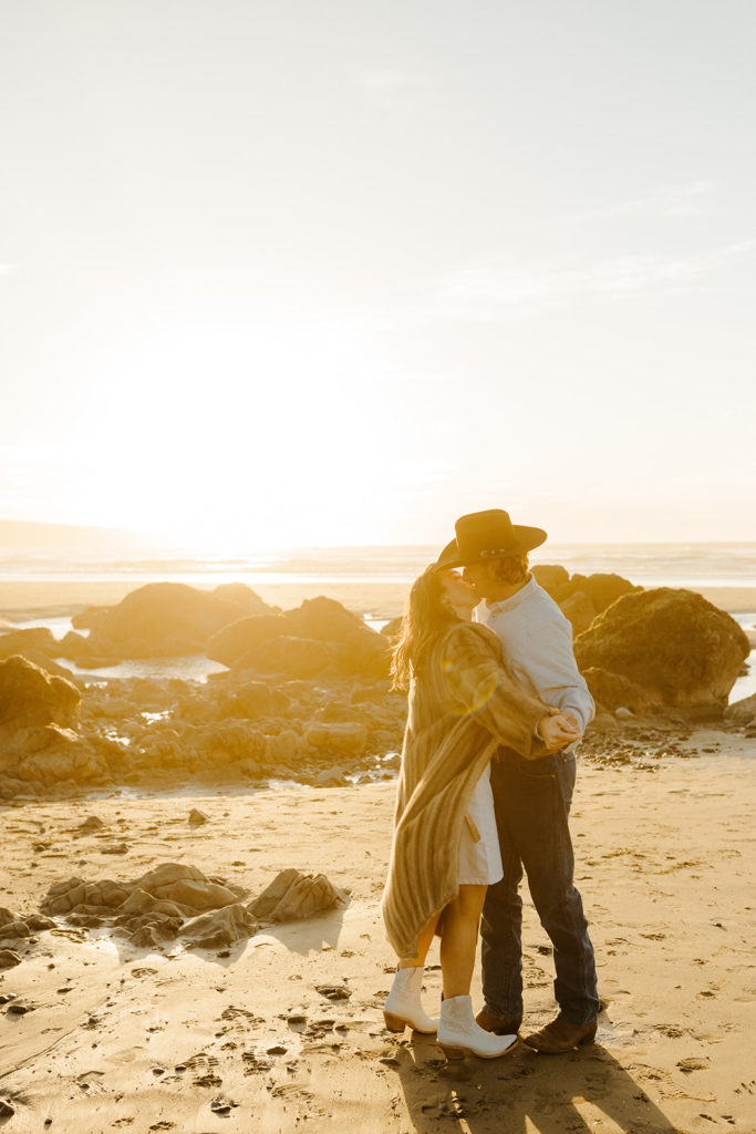 Rachel Christopherson Engagement Photographer-Engaged couple kissing on beach -San Francisco Engagement Photos, Northern California Engagement Photos, Point Reyes Engagement Photos, Bodega Bay Engagement Photos, Dillon Beach Engagement Photos, Bay Area Engagement Photos