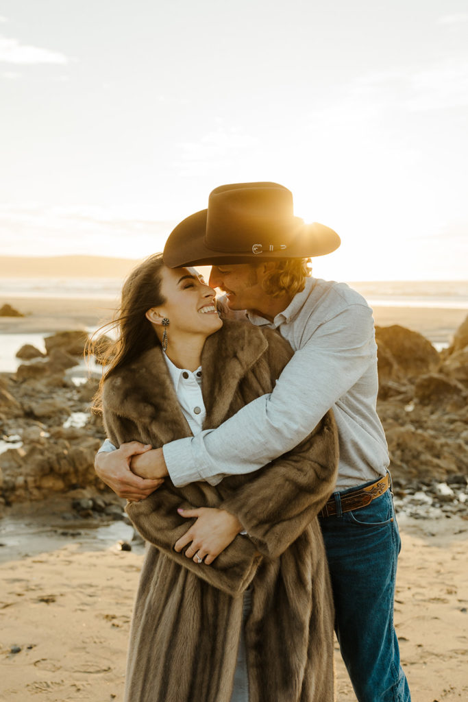 Rachel Christopherson Engagement Photographer-Engaged couple holding each other and smiling-San Francisco Engagement Photos, Northern California Engagement Photos, Point Reyes Engagement Photos, Bodega Bay Engagement Photos, Dillon Beach Engagement Photos, Bay Area Engagement Photos