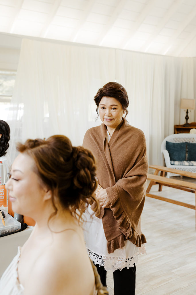 Rachel Christopherson Photography - North Shore Oahu wedding at Sunset Ranch, bride getting ready photos, mother of the bride looking at bride getting ready