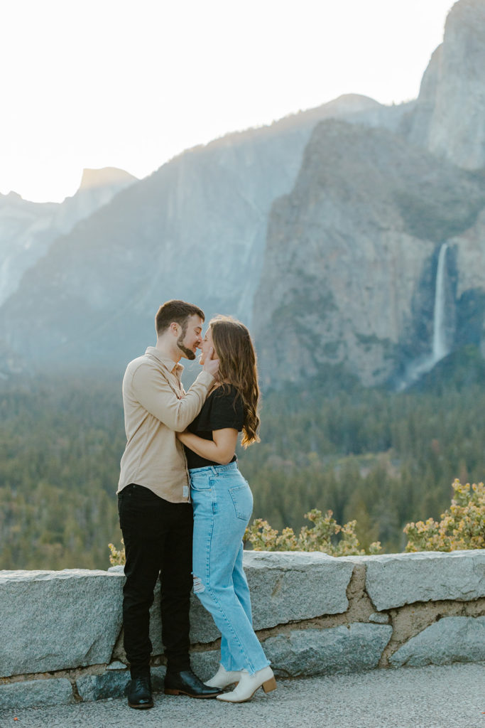 Rachel Christopherson Yosemite Engagement Photographer - Yosemite Falls engagement photos, surprise proposal photos, engaged couple kissing