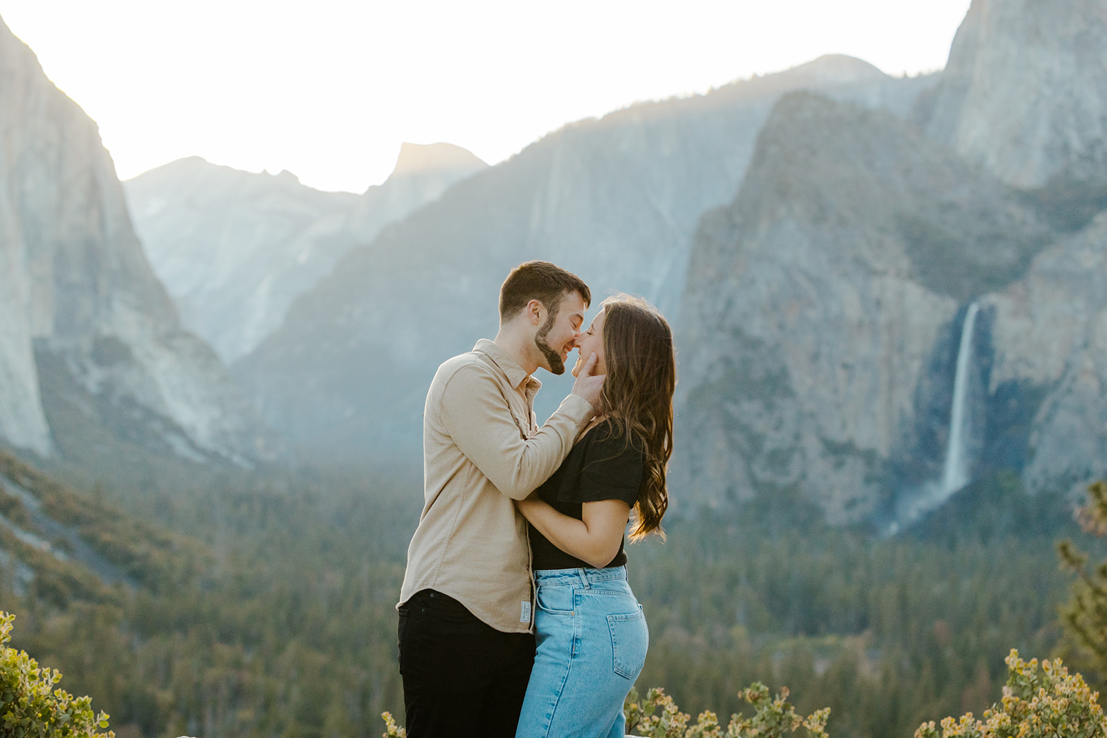 Rachel Christopherson Yosemite Engagement Photographer - Tunnel View engagement photos, surprise proposal photos, engaged couple kissing