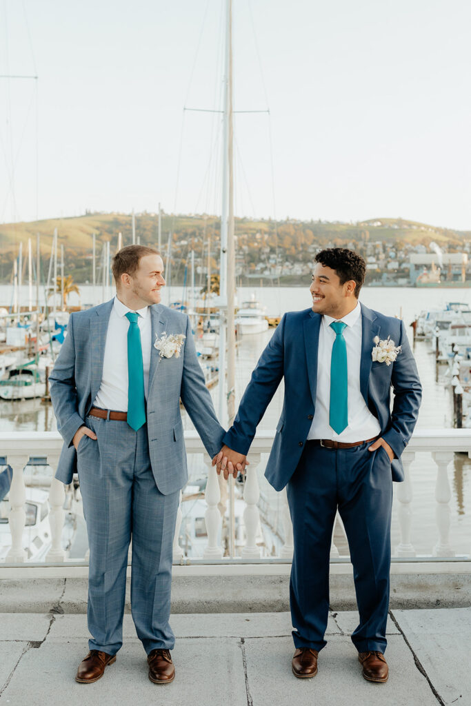 Rachel C Photography - bay area waterfront wedding, grooms holding hands on marina