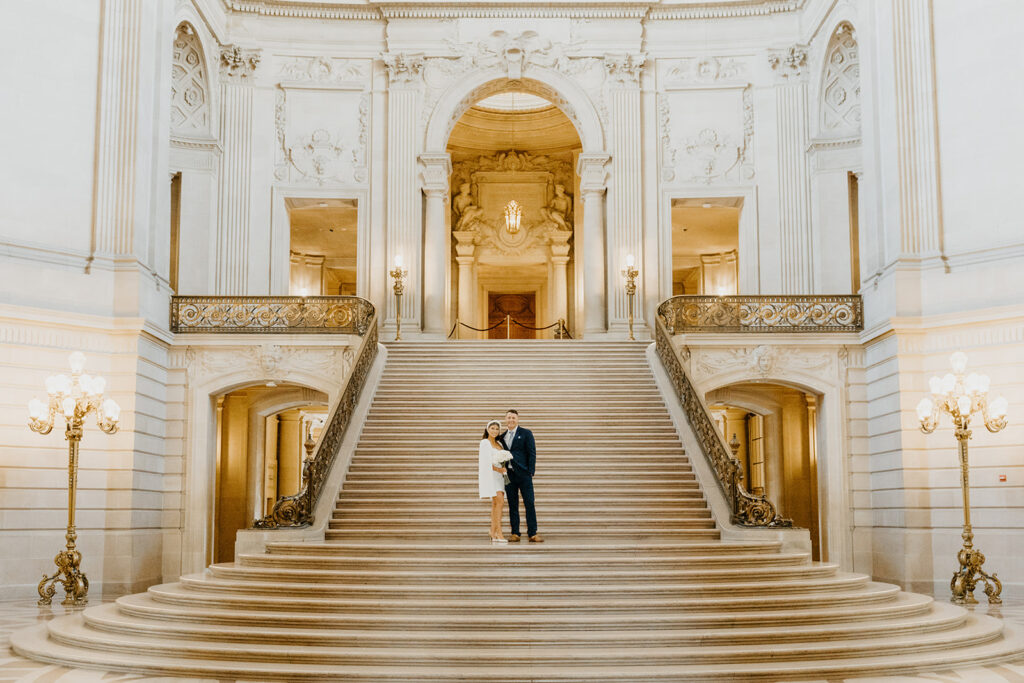 Rachel C Photography- Bride and groom on san francisco city hall stairs