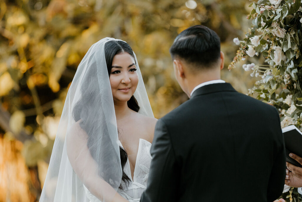 Rachel C Photography - luxury sonoma wedding venues, bride and groom exchanging vows