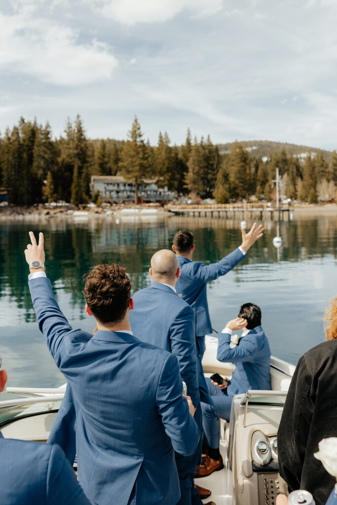 Groom and groomsmen on sailboat on Lake Tahoe