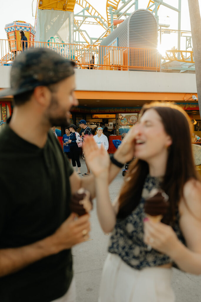 Couple getting ice cream on the Santa Cruz Beach Boardwalk