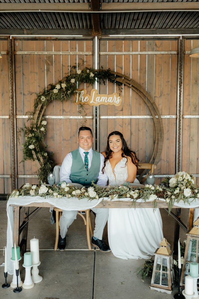 Bride and groom at their sweethearts table