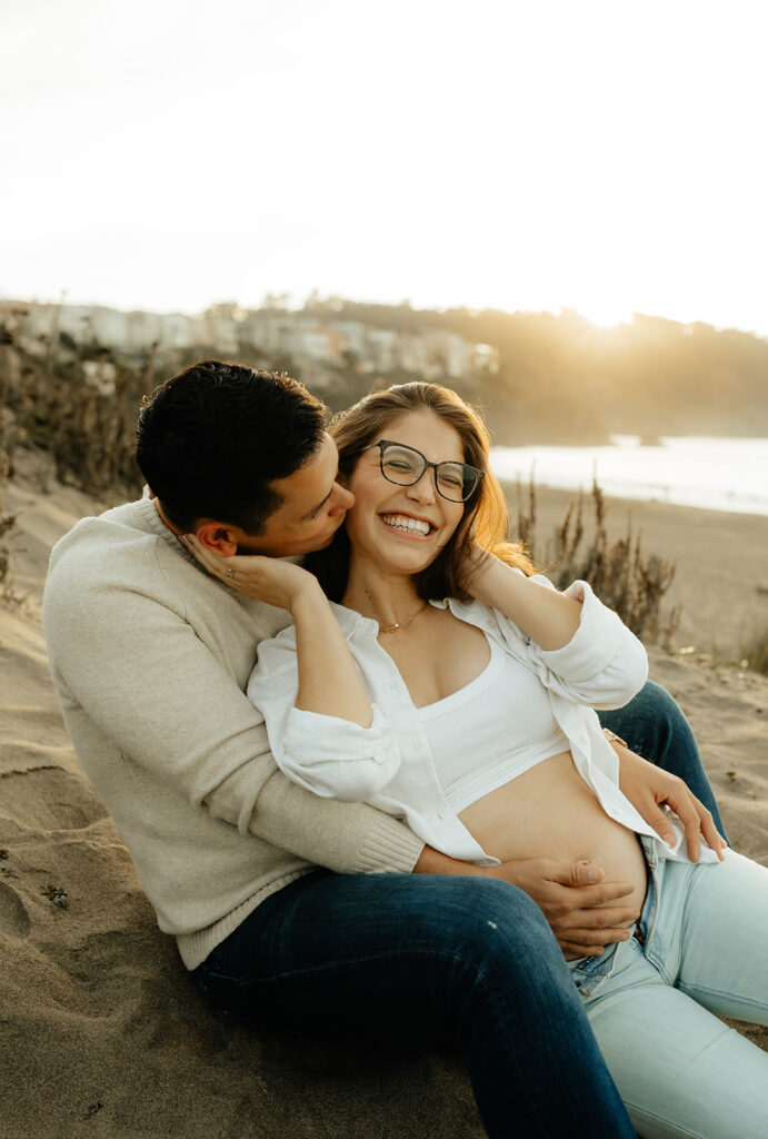 Couples maternity pictures on Bakers Beach in San Francisco, California