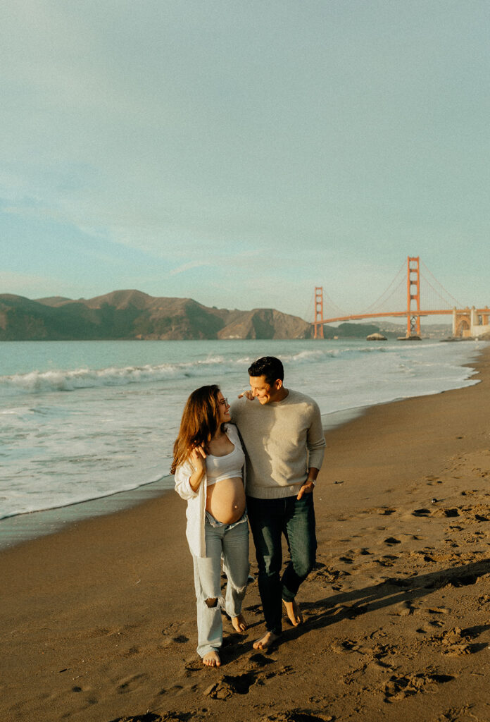 Couples maternity pictures on Bakers Beach in San Francisco, California