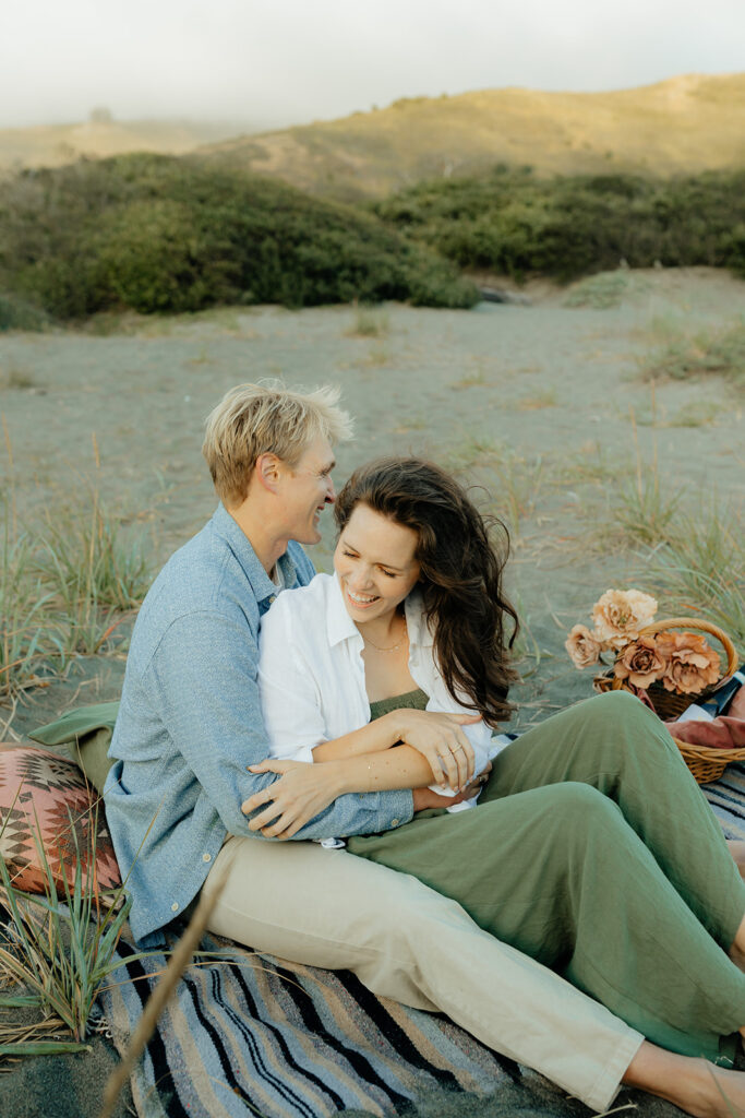 Couple sitting with a picnic