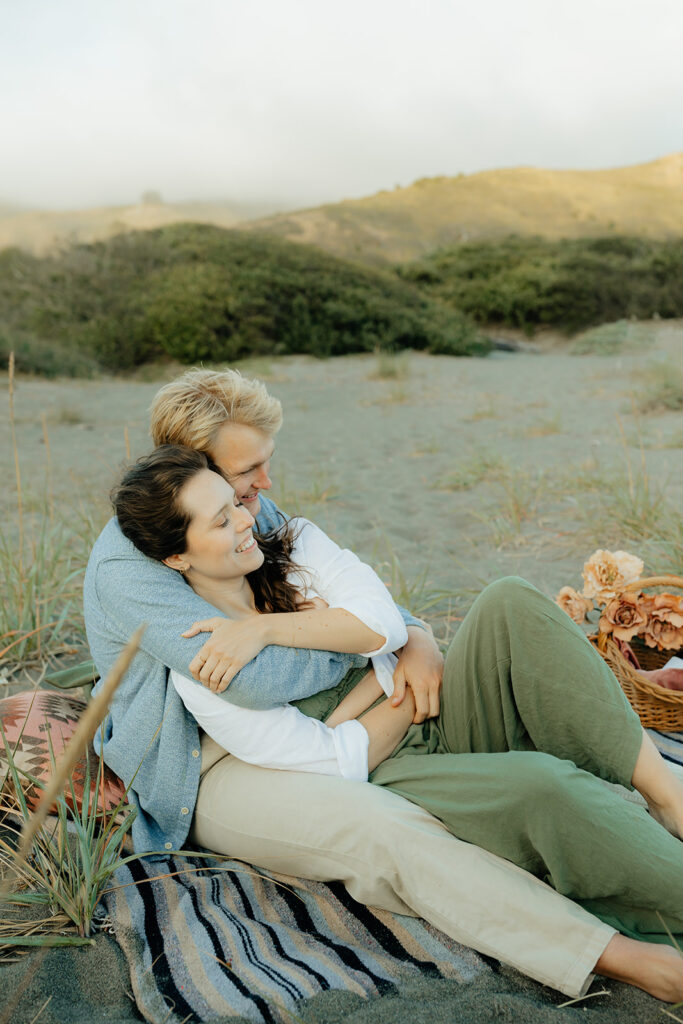 Couple sitting with a picnic