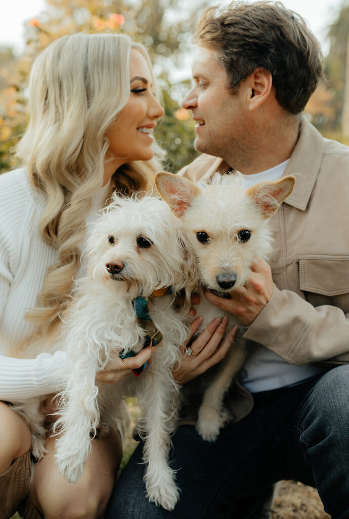 Couples Sacramento engagement photos at McKinley Park with their two dogs