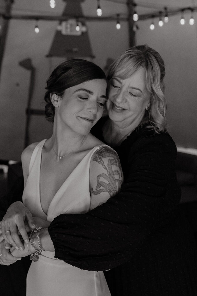bride and her mom hugging
