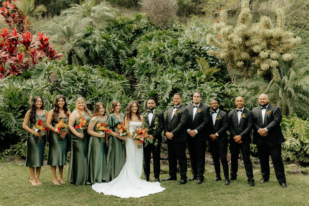 bride and groom with their bridesmaids and groomsmen - Colorful Eco-Friendly Wedding at Kualoa Ranch, HI