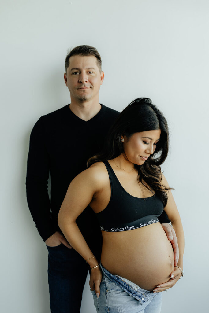 happy couple during their maternity session 