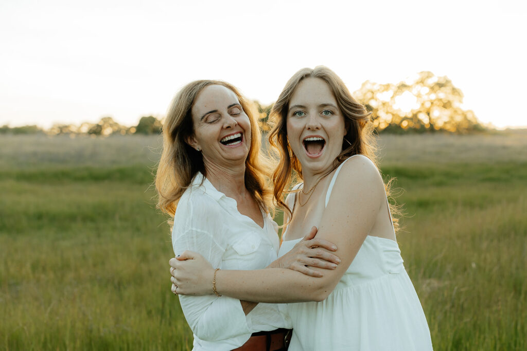 happy mom and daughter at the grad photoshoot