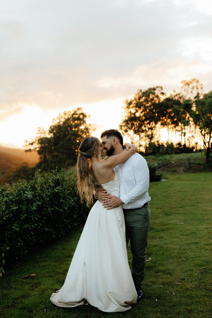 bride and groom kissing after their ethereal intimate wedding 