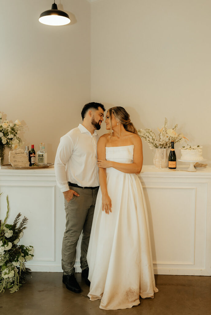 bride and groom looking at each other at their ethereal intimate wedding 